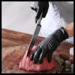 Black vinyl disposable hand gloves